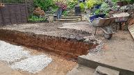 Dig out for split patios in Kings Heath.