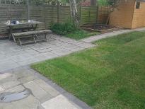 New patio in old york flag stones and natural stone slabbing.