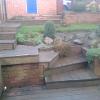 Old decking steps and shrubbery in Selly Oak.