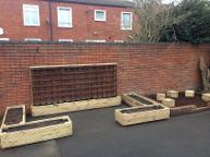 Planters and box seats for infant school in Rubery.