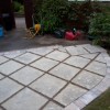 patio with tumble block border and steps