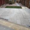 Back garden transformed with natural stone paving, pathways and stoning.