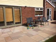 Natural stone paving and tumble blocks.