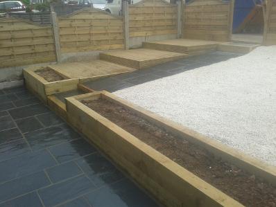 railway sleeper planters, decking and fencing.