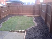 Log borders and shaped tumble block edging in Rowley Regis.