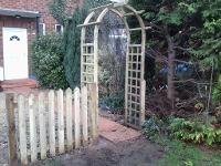 rose archway and picket fencing in Shirley.