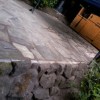 sandstone retainer wall and crazy paving