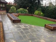 Artificial turf and wythal paving kits in Quinton.