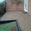 Quality patio in bournville with gold stoning and railway sleepers.
