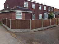 Featheredge panels, gravel boards and slotted posts.
