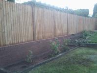 featheredge panels and brick wall in edgbaston.