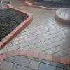 top view of landscaped garden with bullnose stepa and tumble block path.