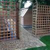 Arched doorway and trellis.