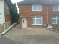 Walls, fencing and driveway in Stirchley.